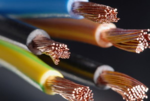close up of different colored wires with their copper interiors showing