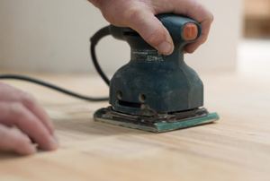 A sander on a wood floor.