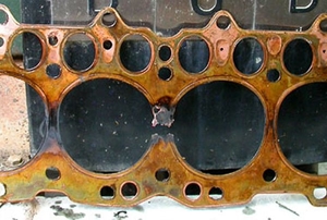 A head gasket removed from a vehicle.