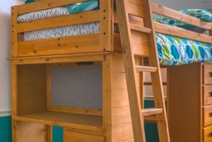 wooden loft bed with ladder