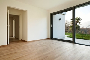 a room with a sliding glass door