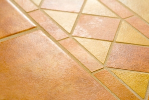 Ceramic tile on the floor.