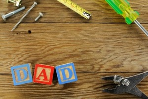 A Father's Day message on a work bench.