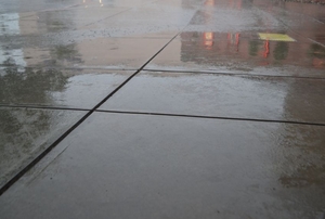 wet concrete driveway