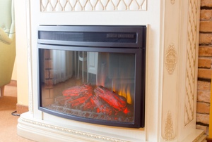 A glass fireplace door.