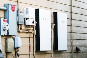 Tesla wall inverter and power battery on exterior wall