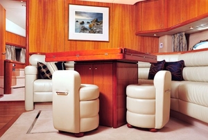 luxury room in a boat with carpeting and furniture