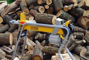 a log splitter in front of a pile of wood