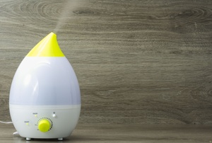 A yellow and white dehumidifier.