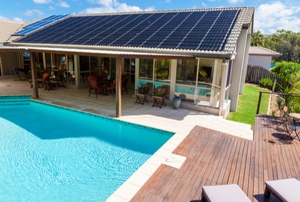 Outdoor pool and patio with solar panels