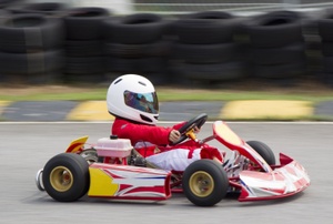 Person driving a go kart