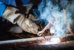 A man welding.