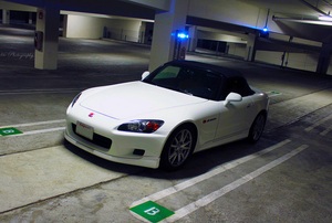 A parked white car.
