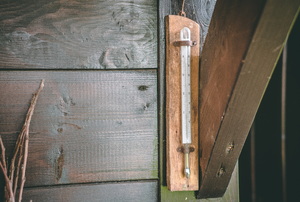 A hanging thermometer.