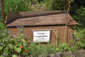 A bin that says worm composting.