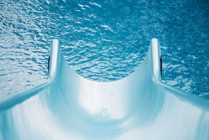 A blue pool slide.
