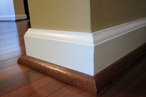 close up of white baseboard on a corner