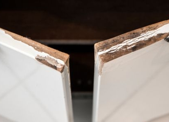white cabinet doors with peeling paint