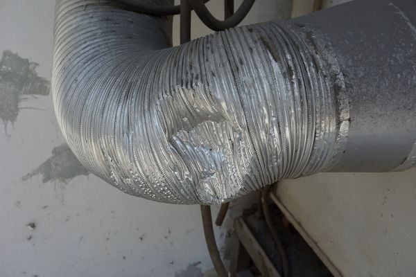 A dented piece of ductwork. 