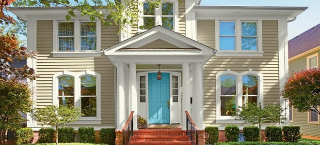 home in spring with blue front door