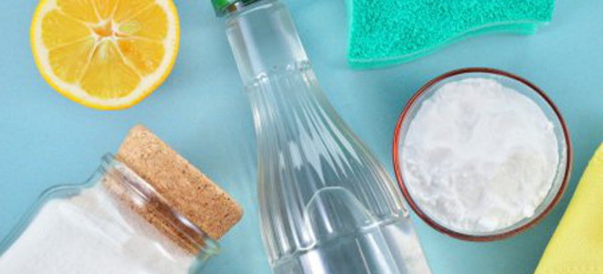 cleaning supplies on a blue table
