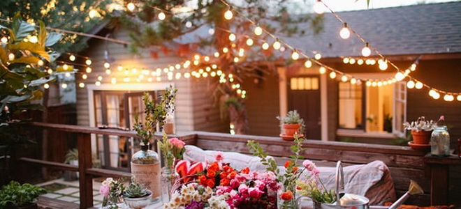 backyard with beautiful lighting and decor