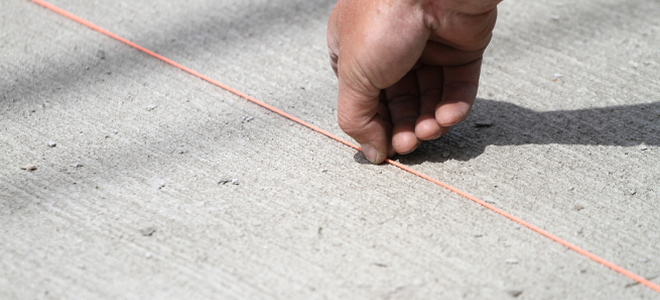 a chalk line on a cement surface