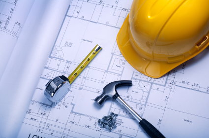 blueprint with tools and hardhat