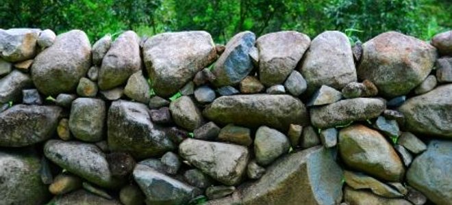 A massive stone wall.