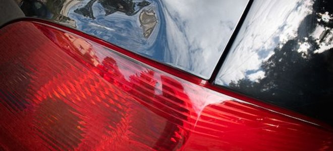 dent above car tail light