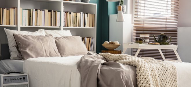 A bed with a headboard.