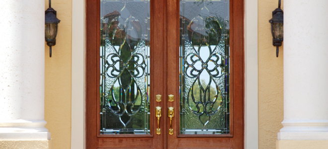 dark wood double front doors on a house
