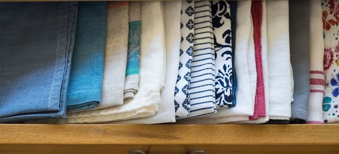 Vintage-looking towels in a cabinet drawer. 