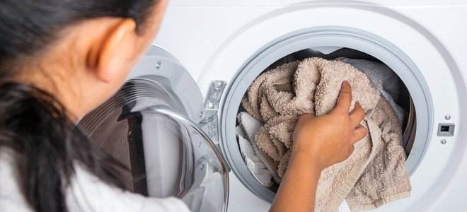 what causes washing machine drain to overflow