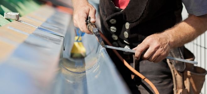 sheet metal roofing flashing under gutter