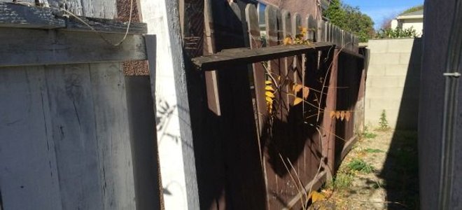 An old fence needing repairs.