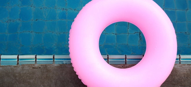 A large, pink inflatable ring.
