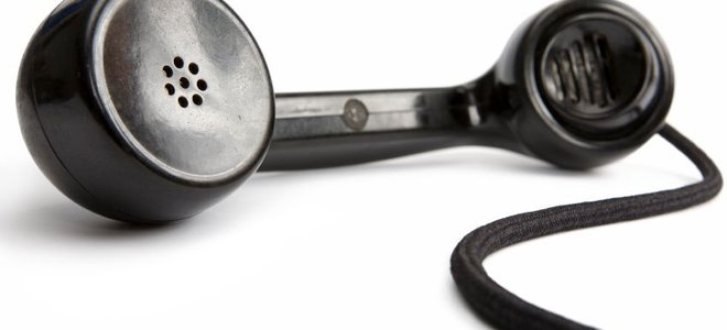 Telephone receiver on a white background.