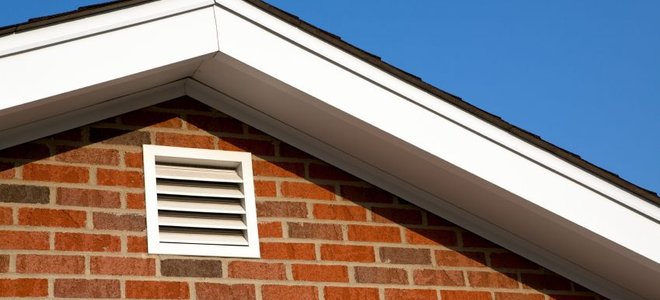 gable vent in brick side of house