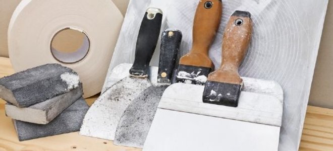 A trowel and other equipment.