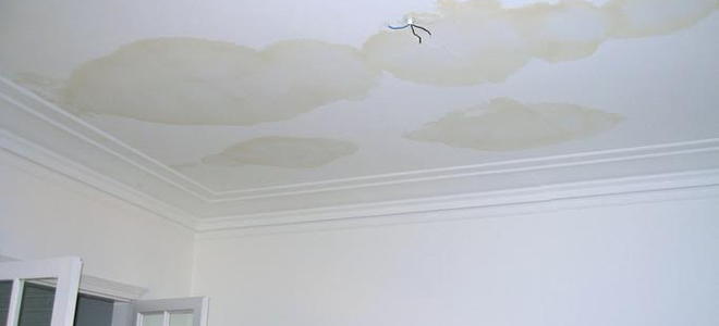 A ceiling with water damage. 