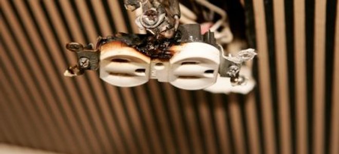 A burned out outlet needing replacement.