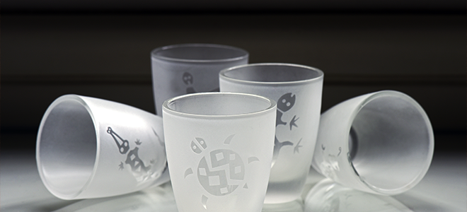 Glass cups with etched designs