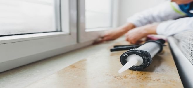 Caulk by a window