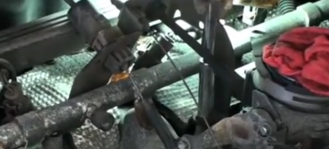 Throttle cable inside an engine