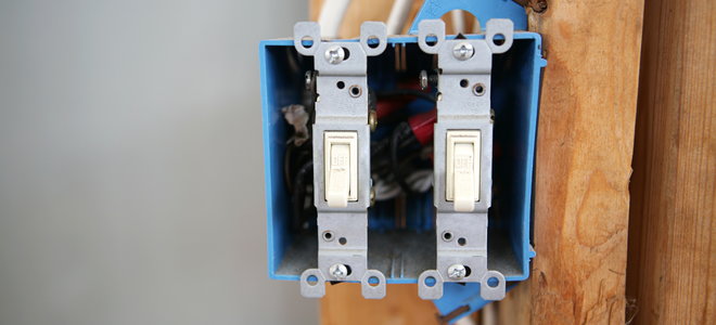 A light switch with wiring.