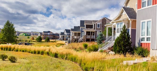 landscaped grass alongside neighborhood homes