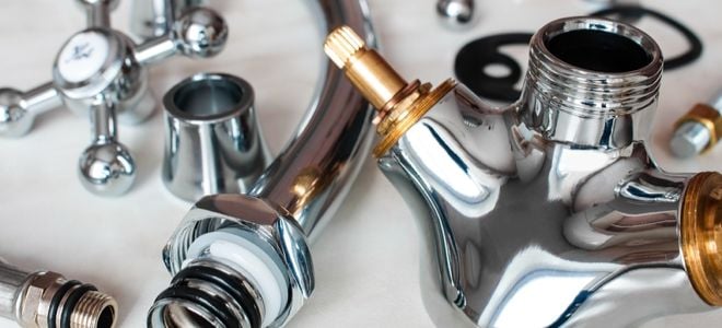 disassembled plumbing parts of a sink