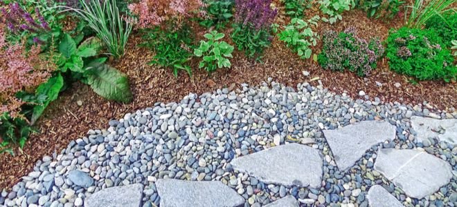gravel landscaping next to a garden