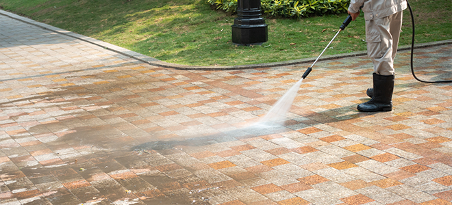 Power washing a driveway